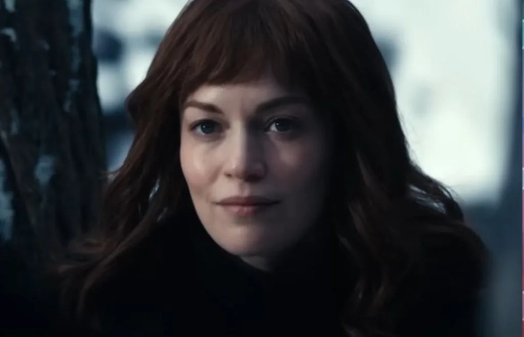 Helly (or Helena Eagan) stands on the snow, moments before being drowned by Irv in Severance episode 2x04.