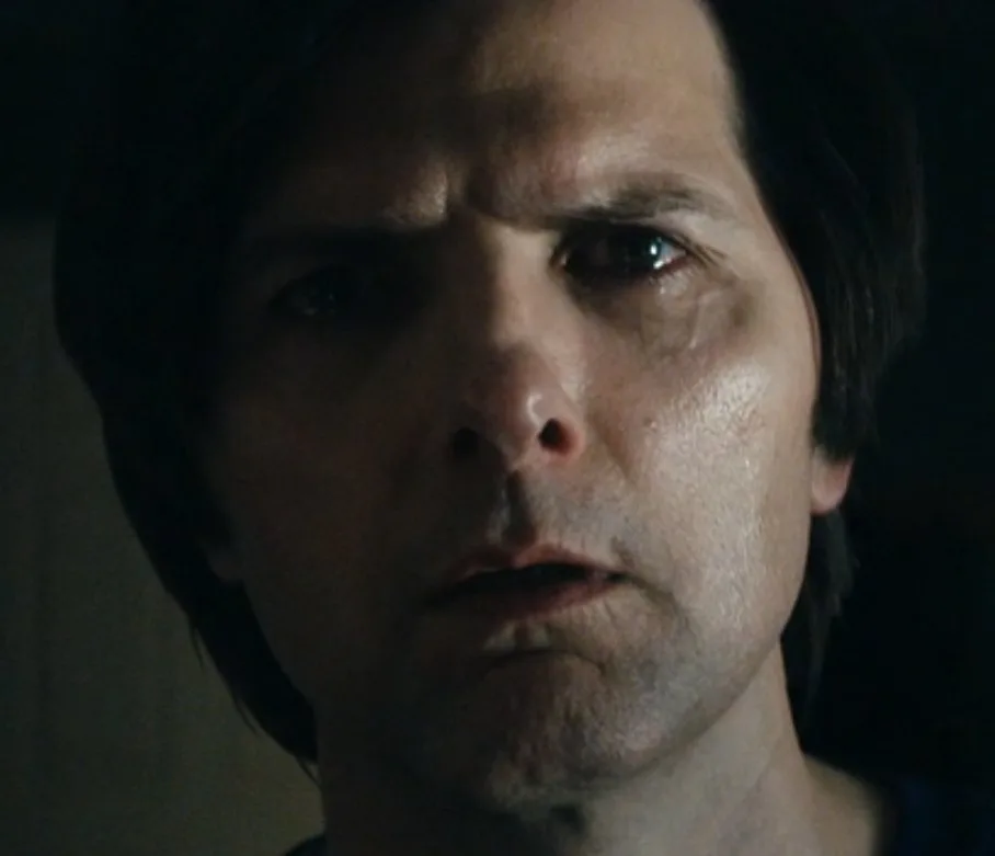 Close-up of Mark with a striking expression at the end of the episode.