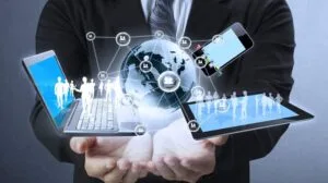 Multiple laptops being displayed, representing screen dependency – How Ready Player One Predicted the Future of Technology