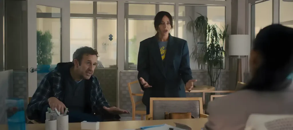 Mike and Amanda argue with the Rivermind representative about intrusive ads. Scene from 'Common People', Black Mirror.