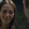Amanda smiles at Mike in one of the final scenes of 'Common People', Black Mirror, symbolizing a farewell moment.