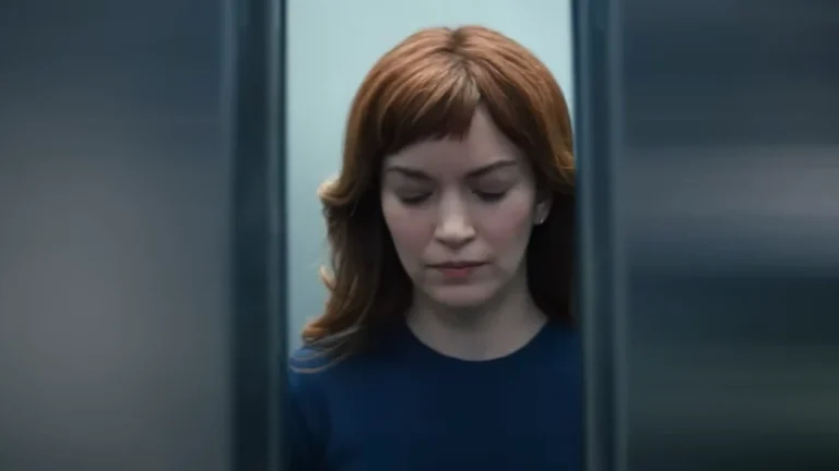 Helly exiting the elevator in Severance, symbolizing the transition between the character's innie and outie versions. - Severance Summary and Plot