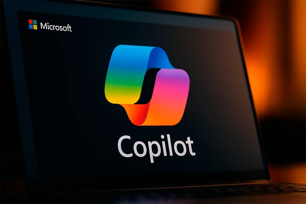 Colorful Microsoft Copilot logo displayed on a laptop screen, representing AI-powered task automation.