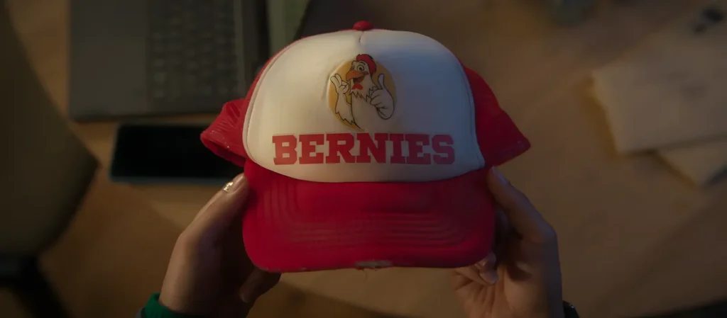 Cap with the 'Bernies' logo, showing Maria was wrong about the restaurant's name in Black Mirror's Bête Noire episode.