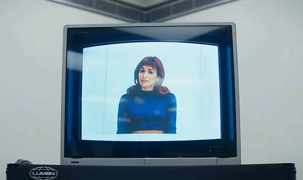 Image from episode 1x04 of Severance where Helly's outie declares that she is a person but her innie is not — a striking moment that shows how the Severance series criticizes work by exposing the erasure of personal identity in corporate environments.